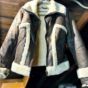 Brown leather jacket with faux fur